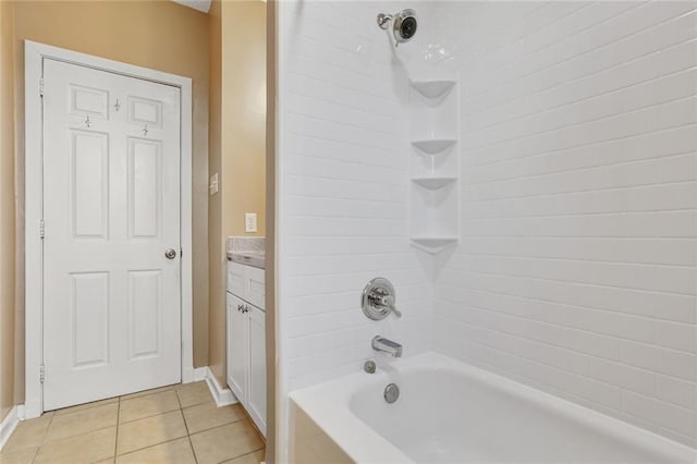 full bathroom featuring shower / tub combination, vanity, tile patterned flooring, and baseboards