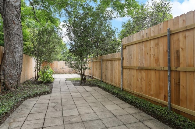 view of patio featuring a fenced backyard