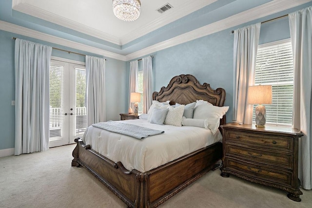 carpeted bedroom featuring visible vents, crown molding, access to exterior, french doors, and a notable chandelier