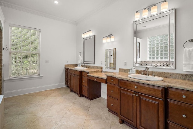 full bath with crown molding, double vanity, a sink, and tile patterned flooring