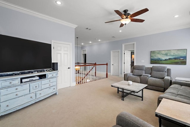 living area featuring recessed lighting, a ceiling fan, visible vents, and ornamental molding