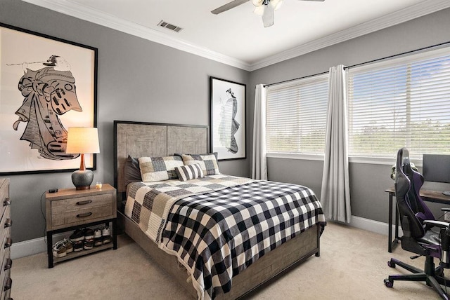 bedroom with visible vents, crown molding, light carpet, baseboards, and a ceiling fan