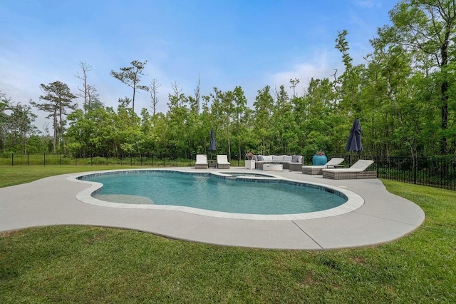 view of pool with fence, a patio, a yard, and outdoor lounge area