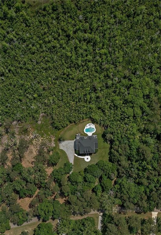 drone / aerial view with a forest view