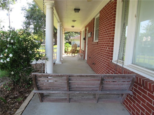 6735 W Magnolia Blvd, Harahan, LA 70123 - view of patio / terrace with a porch