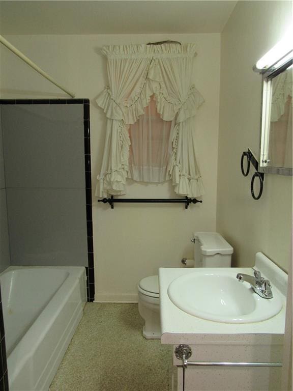 6735 W Magnolia Blvd, Harahan, LA 70123 - full bathroom featuring vanity, washtub / shower combination, and toilet