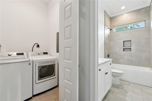 2321 Mehle St, Arabi, LA 70032 - laundry area featuring separate washer and dryer and crown molding