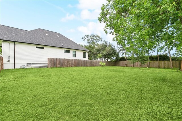2321 Mehle St, Arabi, LA 70032 - view of yard featuring a fenced backyard