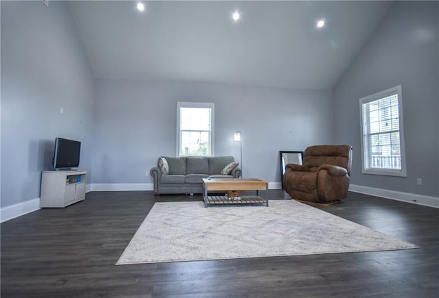 4132 Martin Luther King Jr Blvd, New Orleans, LA 70125 - living room featuring recessed lighting, dark wood finished floors, high vaulted ceiling, and baseboards