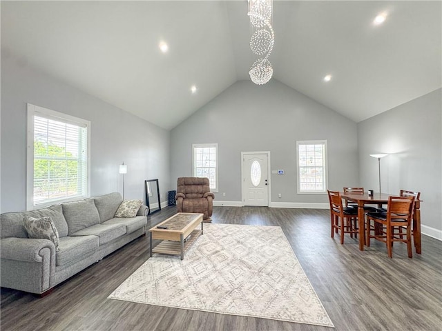 4132 Martin Luther King Jr Blvd, New Orleans, LA 70125 - living room with a wealth of natural light, dark wood-type flooring, and baseboards