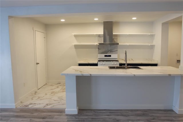 3024 Hero Dr, Gretna, LA 70053 - kitchen with open shelves, white gas range oven, island exhaust hood, a sink, and recessed lighting
