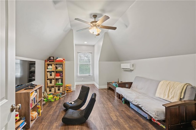 game room featuring wood finished floors, baseboards, a wall unit AC, a ceiling fan, and lofted ceiling