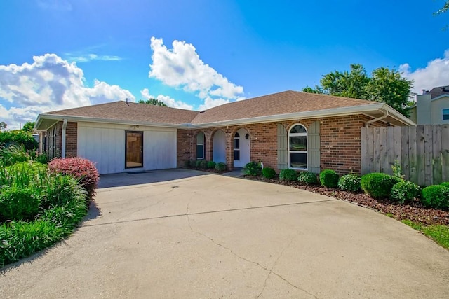 5 N Lafourche Ct, Kenner, LA 70065 - single story home with brick siding, fence, a shingled roof, and concrete driveway