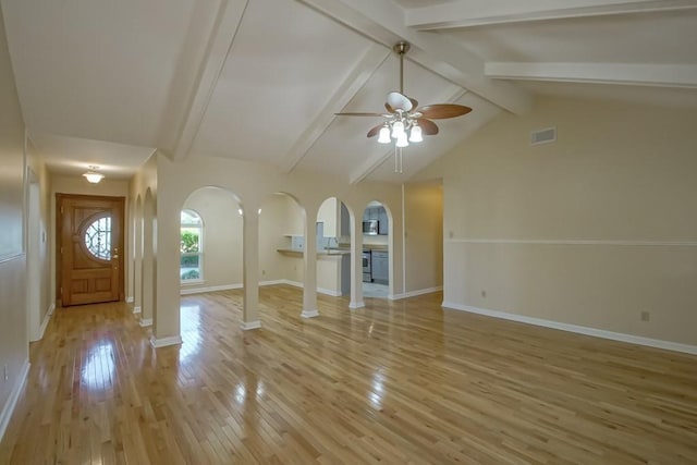 5 N Lafourche Ct, Kenner, LA 70065 - entryway featuring ceiling fan, vaulted ceiling with beams, light wood-type flooring, visible vents, and arched walkways