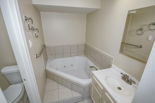 5 N Lafourche Ct, Kenner, LA 70065 - full bath with toilet, tile patterned floors, a jetted tub, and vanity
