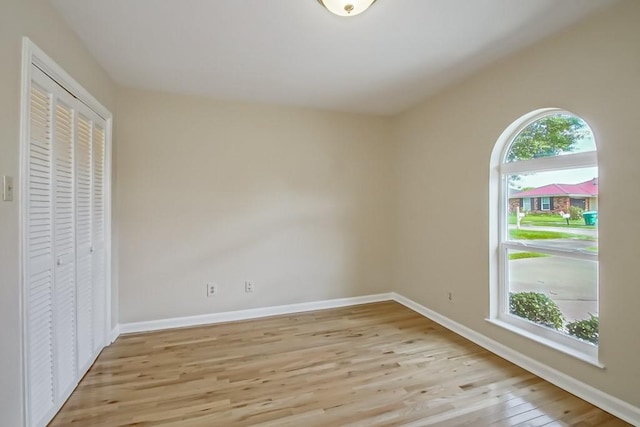 5 N Lafourche Ct, Kenner, LA 70065 - unfurnished bedroom with a closet, light wood-style flooring, and baseboards
