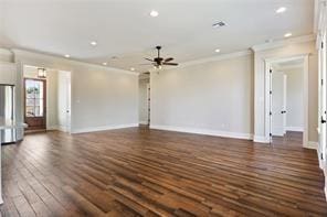2832 Pirate Dr, Chalmette, LA 70043 - unfurnished living room with crown molding, a ceiling fan, recessed lighting, and dark wood finished floors