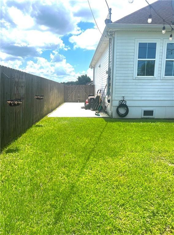 2832 Pirate Dr, Chalmette, LA 70043 - fenced backyard featuring a patio area