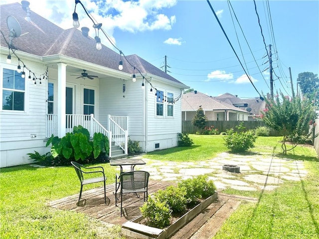 2832 Pirate Dr, Chalmette, LA 70043 - view of yard with an outdoor fire pit and ceiling fan