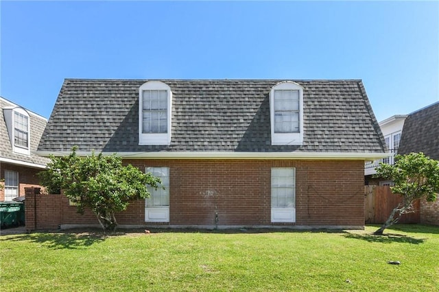 2805 Kingman St, Metairie, LA 70006 - back of property featuring mansard roof, brick siding, and a shingled roof