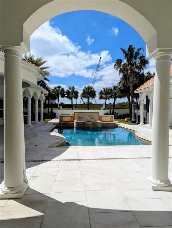 pool with a patio area