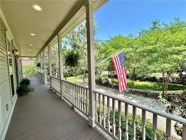 wooden terrace featuring a porch