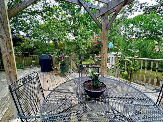 wooden deck with a pergola