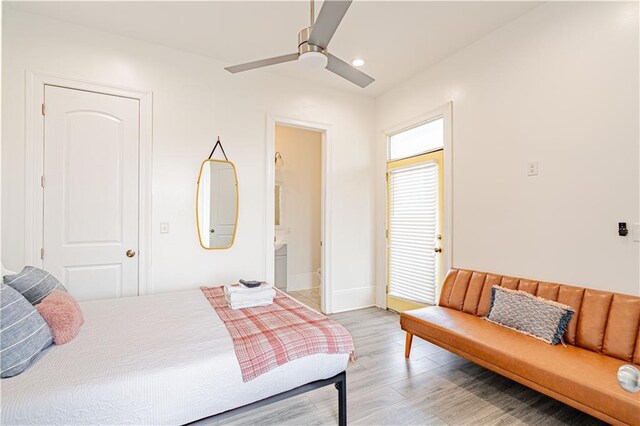 1379 Saint Anthony St, New Orleans, LA 70116 - bedroom with ceiling fan, ensuite bath, recessed lighting, baseboards, and light wood-type flooring