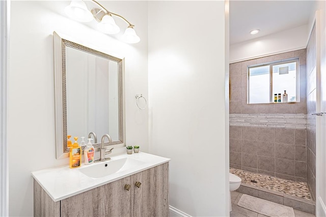 1379 Saint Anthony St, New Orleans, LA 70116 - full bath with vanity, tile patterned floors, toilet, and tiled shower