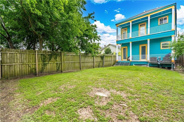1379 Saint Anthony St, New Orleans, LA 70116 - view of yard featuring a fenced backyard, covered porch, central AC, and a balcony