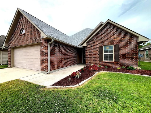 11601 Mary Lee Dr, Denham Springs, LA 70726 - view of front facade featuring a garage, a front lawn, brick siding, a shingled roof, and concrete driveway
