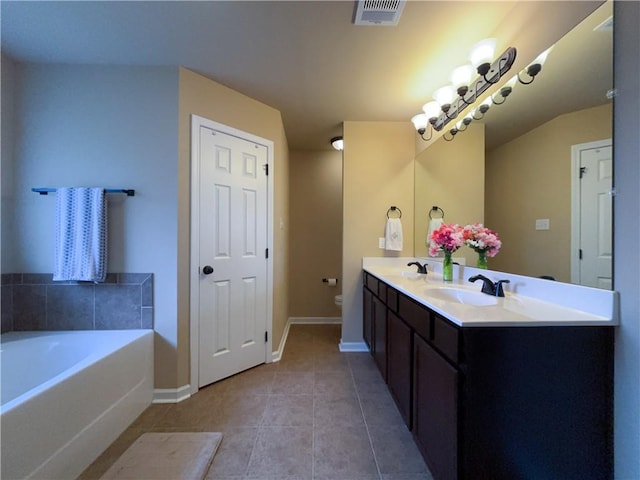 11601 Mary Lee Dr, Denham Springs, LA 70726 - full bath featuring visible vents, a sink, baseboards, and tile patterned floors