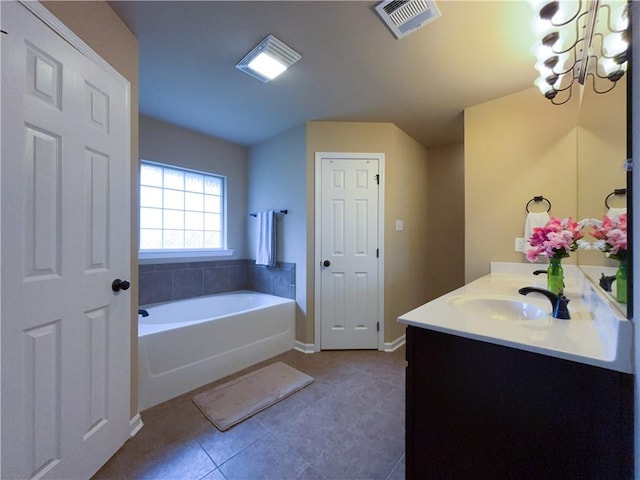 11601 Mary Lee Dr, Denham Springs, LA 70726 - full bathroom featuring a bath, visible vents, tile patterned flooring, baseboards, and vanity
