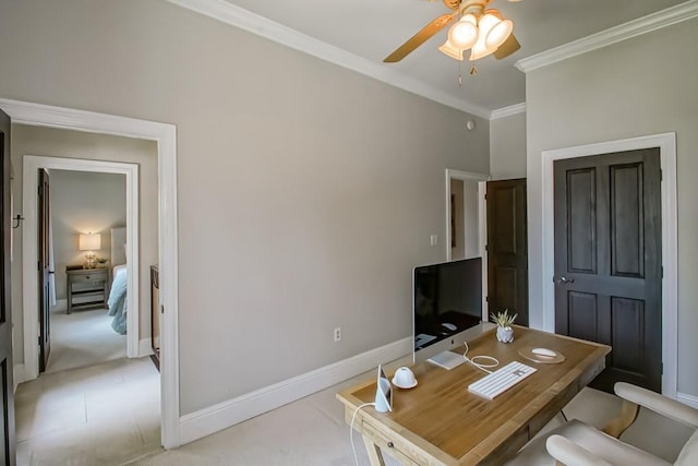 office featuring crown molding, a ceiling fan, and baseboards