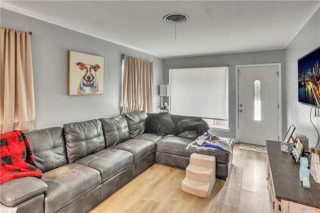620 Maryland Ave, Metairie, LA 70003 - living room with visible vents and wood finished floors
