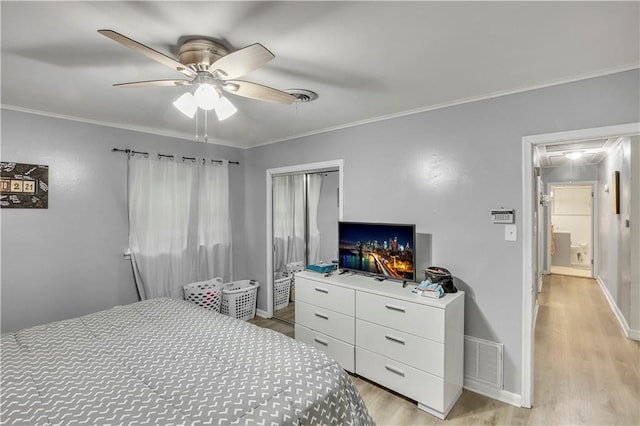620 Maryland Ave, Metairie, LA 70003 - bedroom with attic access, light wood-type flooring, visible vents, and ornamental molding