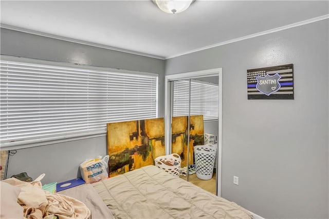620 Maryland Ave, Metairie, LA 70003 - bedroom with ornamental molding and a closet