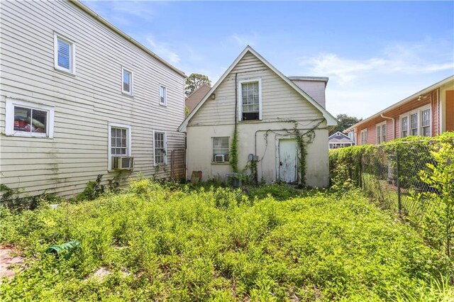 1717 Foucher St, New Orleans, LA 70115 - back of property with fence and cooling unit