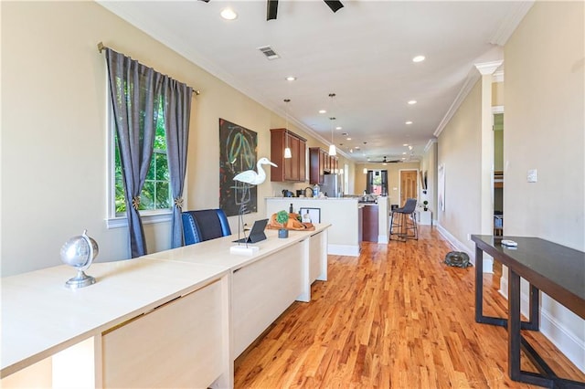 2608 Republic St, New Orleans, LA 70119 - kitchen with a ceiling fan, crown molding, recessed lighting, a peninsula, and light wood-type flooring