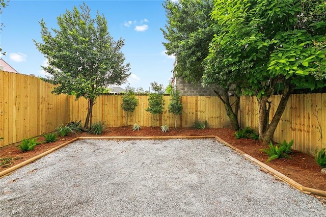 exterior space featuring a fenced backyard