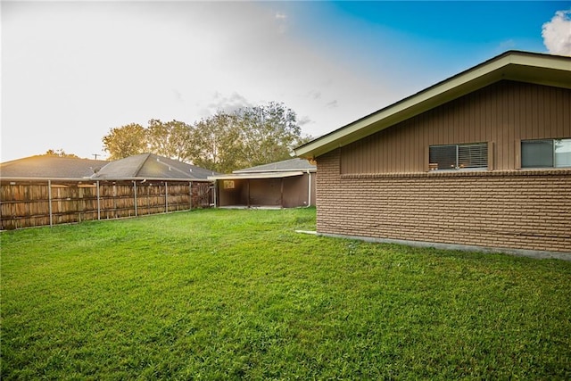 view of yard featuring fence