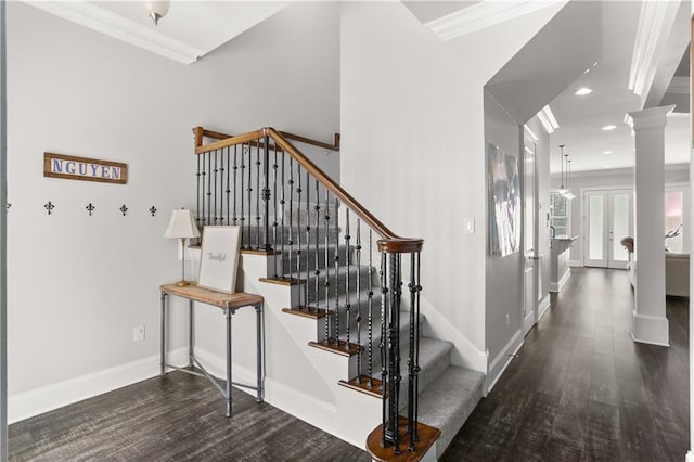 stairs with crown molding, decorative columns, wood finished floors, baseboards, and recessed lighting