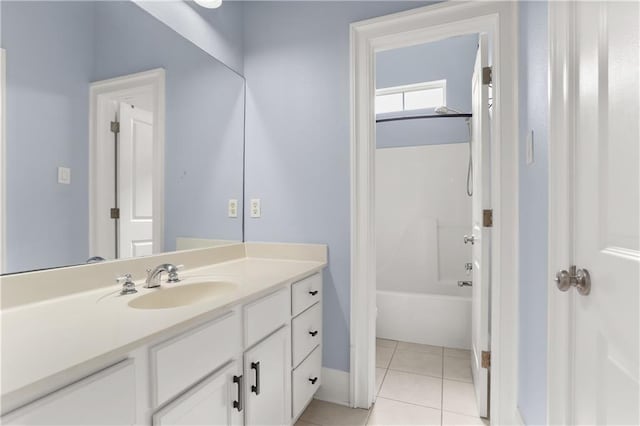 full bath featuring tile patterned floors,  shower combination, and vanity