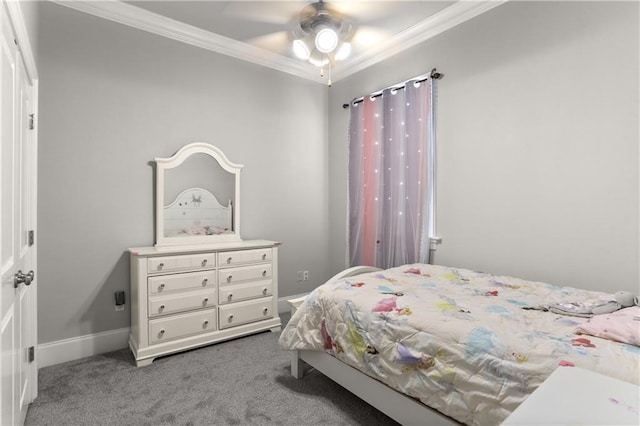 carpeted bedroom with baseboards, ornamental molding, and ceiling fan