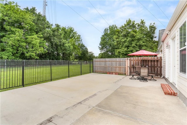 view of patio / terrace with a fenced backyard and outdoor dining space