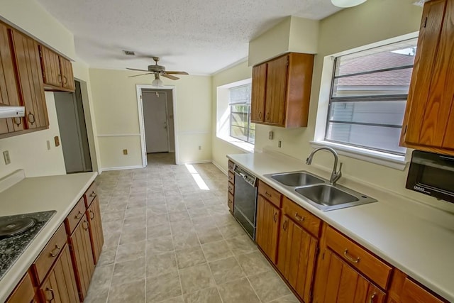 kitchen featuring a sink, light countertops, ceiling fan, and dishwasher