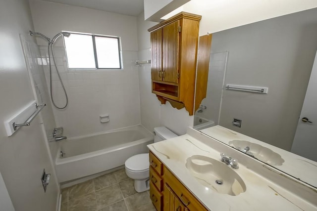 bathroom with vanity, shower / bathing tub combination, and toilet