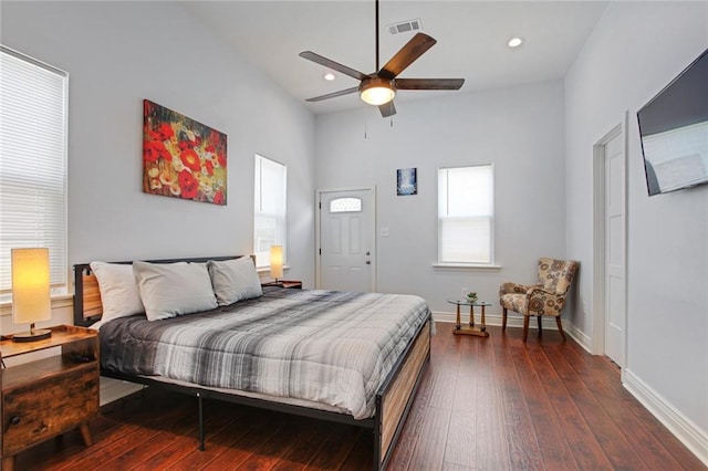 2430 Clara St, New Orleans, LA 70113 - bedroom with dark wood-style floors, multiple windows, recessed lighting, and a ceiling fan