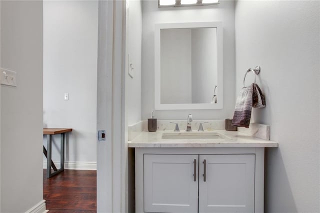 2430 Clara St, New Orleans, LA 70113 - bathroom with vanity and wood finished floors