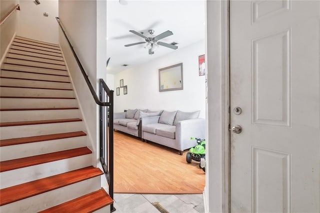1209 Tallow Tree Ln, Harvey, LA 70058 - staircase with a ceiling fan
